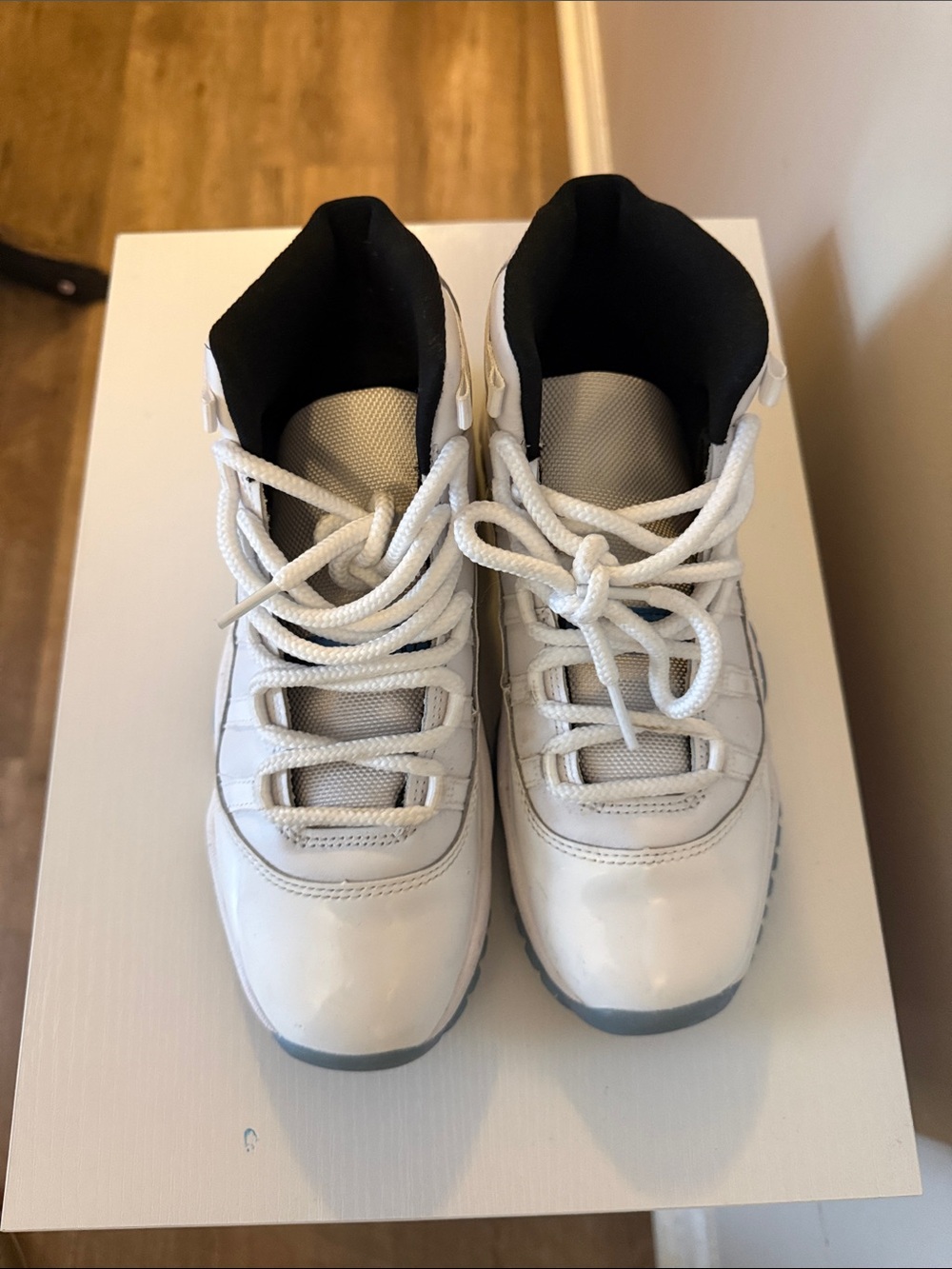 Kids White and Black High-Top Athletic Shoes Jordan 11s